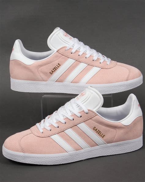 white and pink adidas trainers